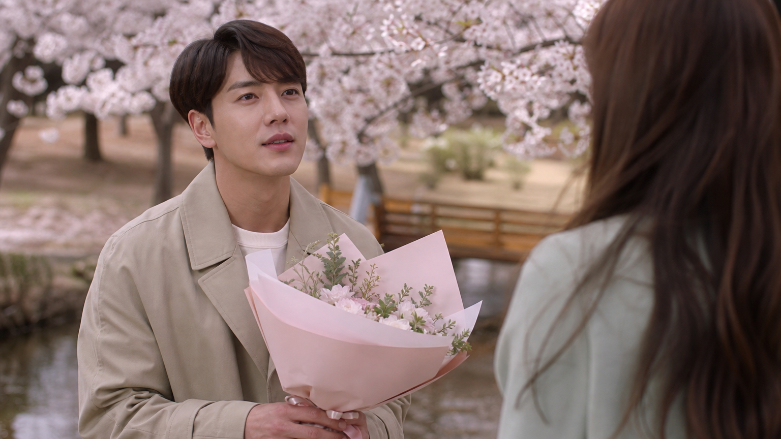봄날 벚꽃 아래 사랑을 고백하는 감정적인 장면