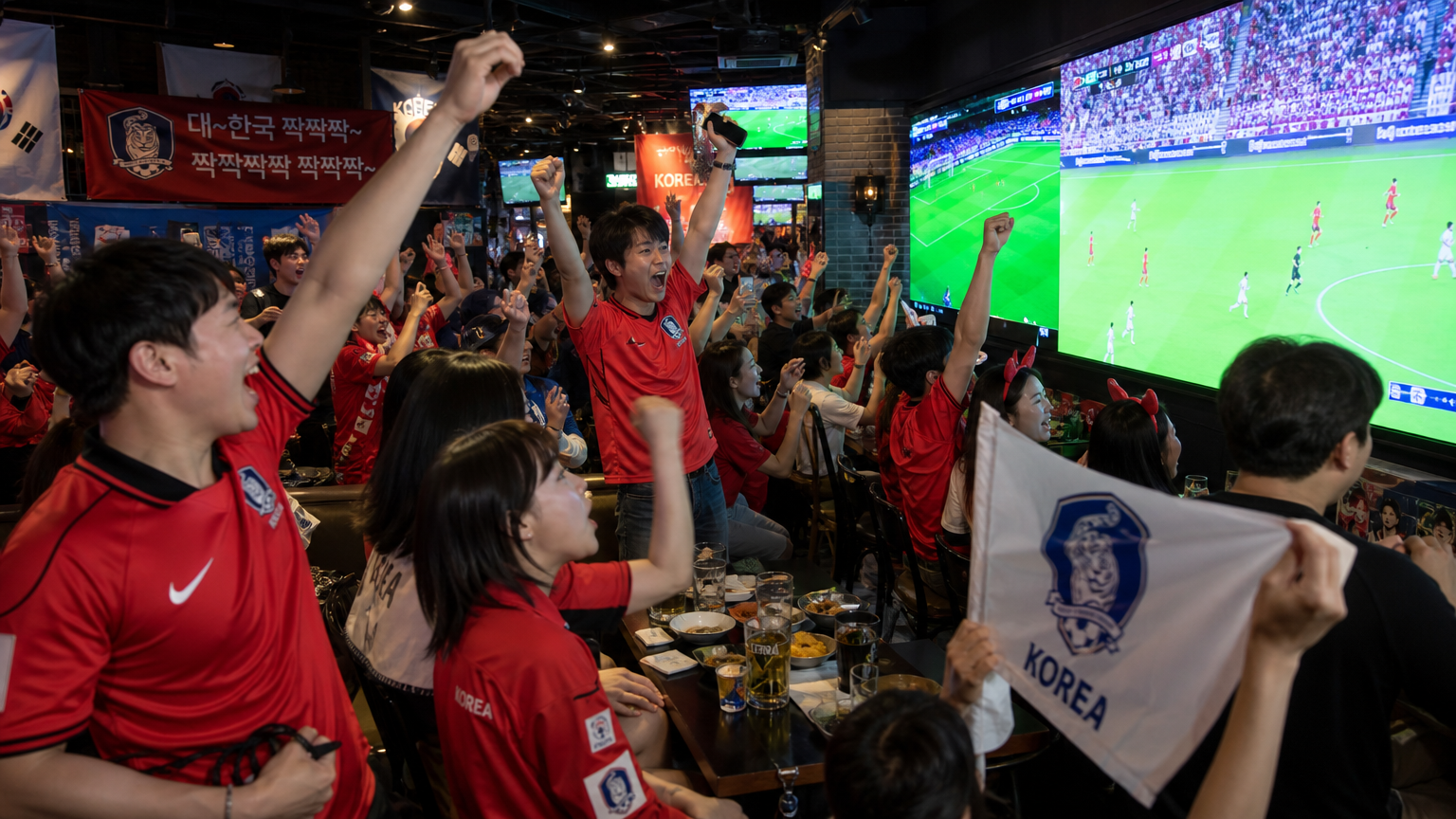 현대적인 스포츠 바에서 열띤 응원을 펼치는 축구 팬들