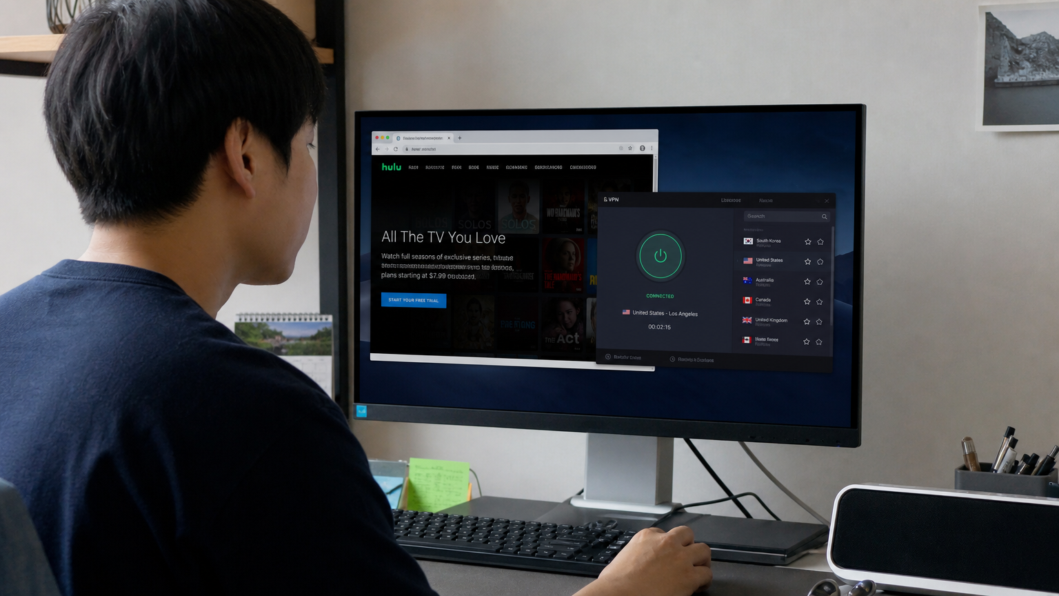 컴퓨터로 VPN 소프트웨어를 사용해 다른 국가에 연결된 모습을 보여주는 성인